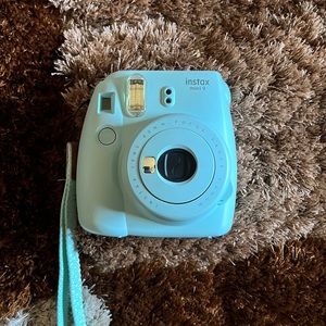 Baby blue polaroid camera w/bag and batteries included